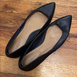 Calvin Klein black leather flats
